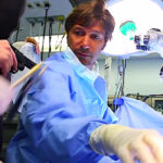 Rage Against The Machine & Rush Members Perform Spinal Surgery In Future User's "Voodoo Juju"