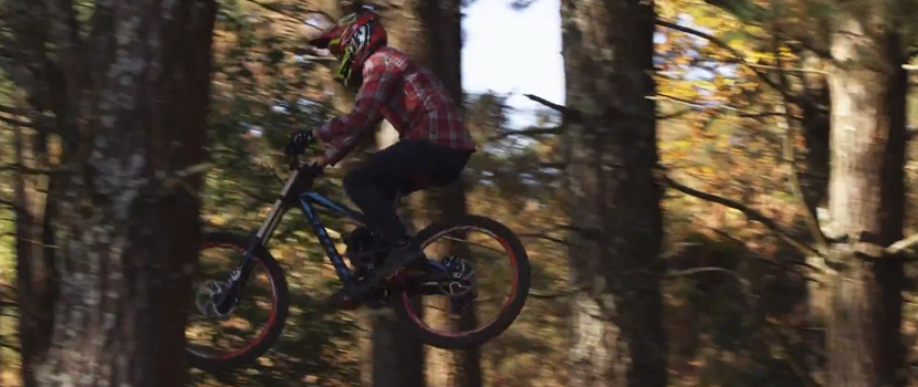 Watch Gojira's Bassist Jean-Michel Labadie Rip Up The Mountainside On A Downhill Bike