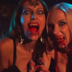 Huntress' New "Sorrow" Music Video Is Pretty Much A Sexy Horror B-Movie