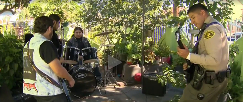 Watch Sheriff's Deputy Jam With Metal Band In Compton, CA