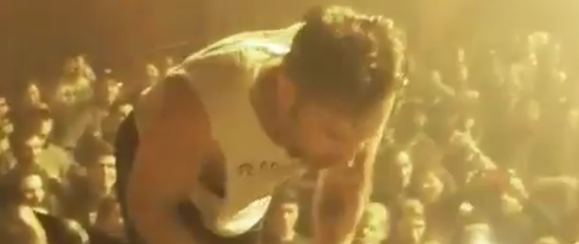Watch The Dillinger Escape Plan's Singer Help Himself To A Fan's Burger On The Balcony Mid-Set