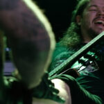 Watch Mutoid Man's Bassist Get Tattooed While Playing A Show