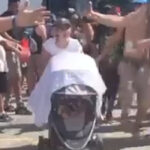Here's A Woman Bringing A Baby Into Fit For A King's Circle Pit