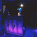 Watch Queens Of The Stone Age Perform A Piano Driven Cover & More For BBC Radio 1