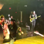 Watch Killswitch Engage's Adam Dutkiewicz Be Fed Pizza Mid-Guitar Solo At Worcester, MA Show
