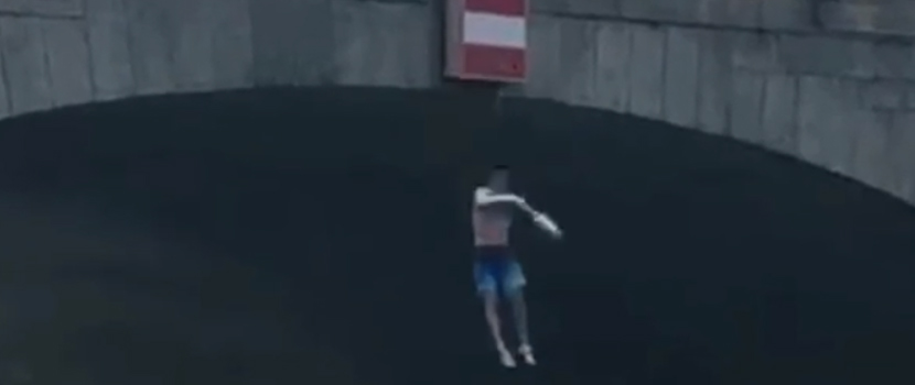 Here's Tim Commerford (Rage Against The Machine, Etc.) Jumping Off A Bridge