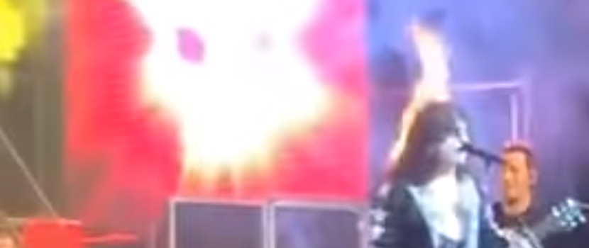 Tribute Band Vocalist/Guitarist Continues To Perform Kiss Cover Despite His Hair Catching Fire