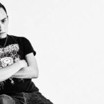 The Star Of Netflix's 'Atypical' Fronts Grind & Death Metal Bands On The Side