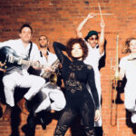 Brass Against Greeted By An Onstage 'No Pee Zone' Sign At Opening Date Of European/UK Tour With Tool