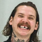 The Devil Wears Prada Vocalist Mike Hranica Launches GoFundMe To Fix Tooth He Lost Playing Hockey