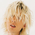 Machine Gun Kelly Slams Slipknot Onstage At 2021 'Riot Fest'