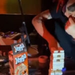 Watch Tool's Maynard James Keenan Attempt To Play Jenga Behind Danny Carey's Drum Kit During A Live Show