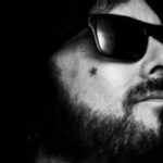 Mötley Crüe's Nikki Sixx Calls Pearl Jam "One Of The Most Boring Bands In History" After Eddie Vedder Disparages 80s Glam Metal Scene