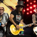 Watch Axl Rose Throw A Mic At The Drums Of Isaac Carpenter & More During Guns N' Roses' Recent Buenos Aires Show