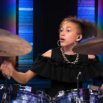 Watch Nandi Bushell Come Up With Her Own Drum Parts For Dio's "Holy Diver"