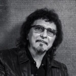 Hear Black Sabbath's Tony Iommi Guest On Robbie Williams' New Track "Rocket"