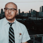 Doc Coyle (Bad Wolves/God Forbid) Drops 'Falling Down'-Inspired Video For His Cover Of Aerosmith's "Livin' On The Edge"