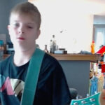 A Youngster's Inventive Pit Moves Steal The Show In A New Kublai Khan TX Guitar Cover Video