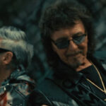 See Black Sabbath's Tony Iommi Guest In Robbie Williams' "Rocket" Music Video