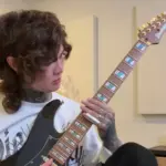 Polyphia's Tim Henson Demonstrates His Burgeoning Slide Guitar Chops With "He Is Risen"