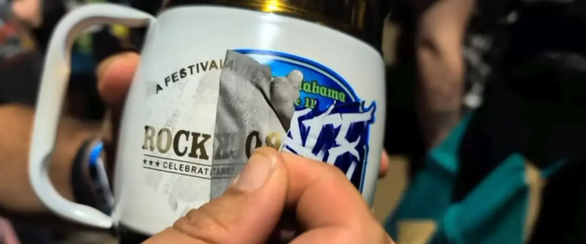 Mugs For The 2026 'Furnace Fest' Were Reportedly Repurposed Merch From The MAGA-Aligned 'Rock The Country' Festival